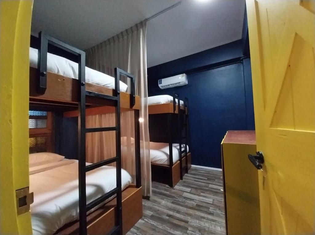 Postel nebo postele na pokoji v ubytování W168 hostel