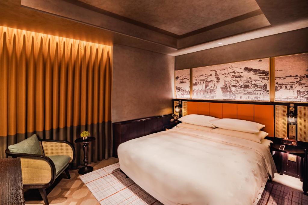Postel nebo postele na pokoji v ubytování Hotel Central 新中央酒店