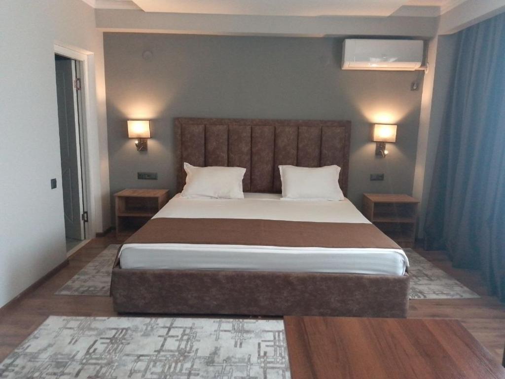 Cama ou camas em um quarto em Ziyorat Luxury