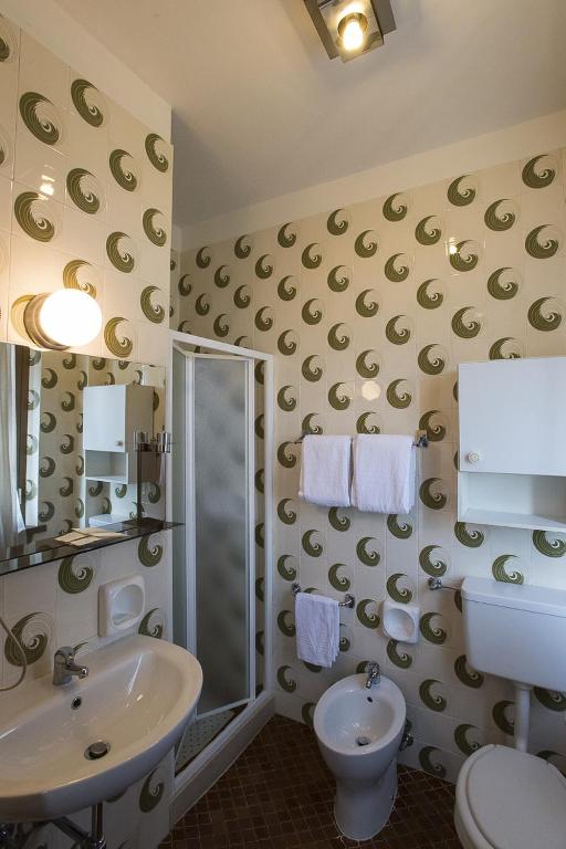 Koupelna v ubytování Albergo Rossana