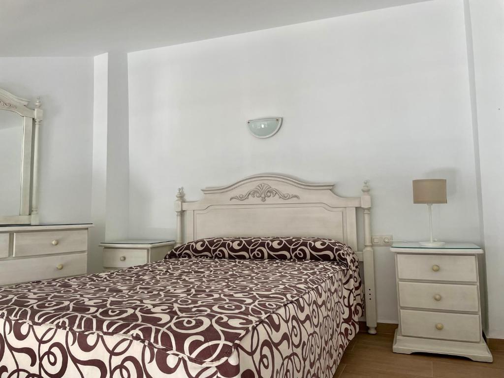 Postel nebo postele na pokoji v ubytování Apartamentos Balcón de Maro