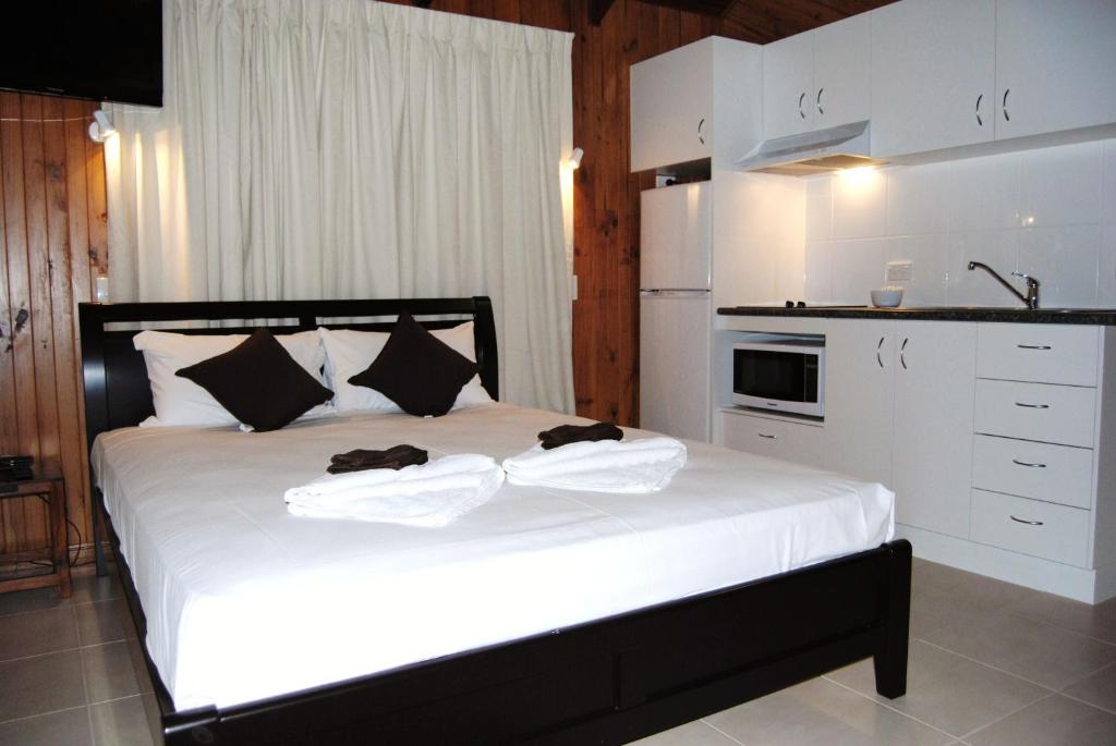 Kuchyň nebo kuchyňský kout v ubytování Airlie Beach Apartments