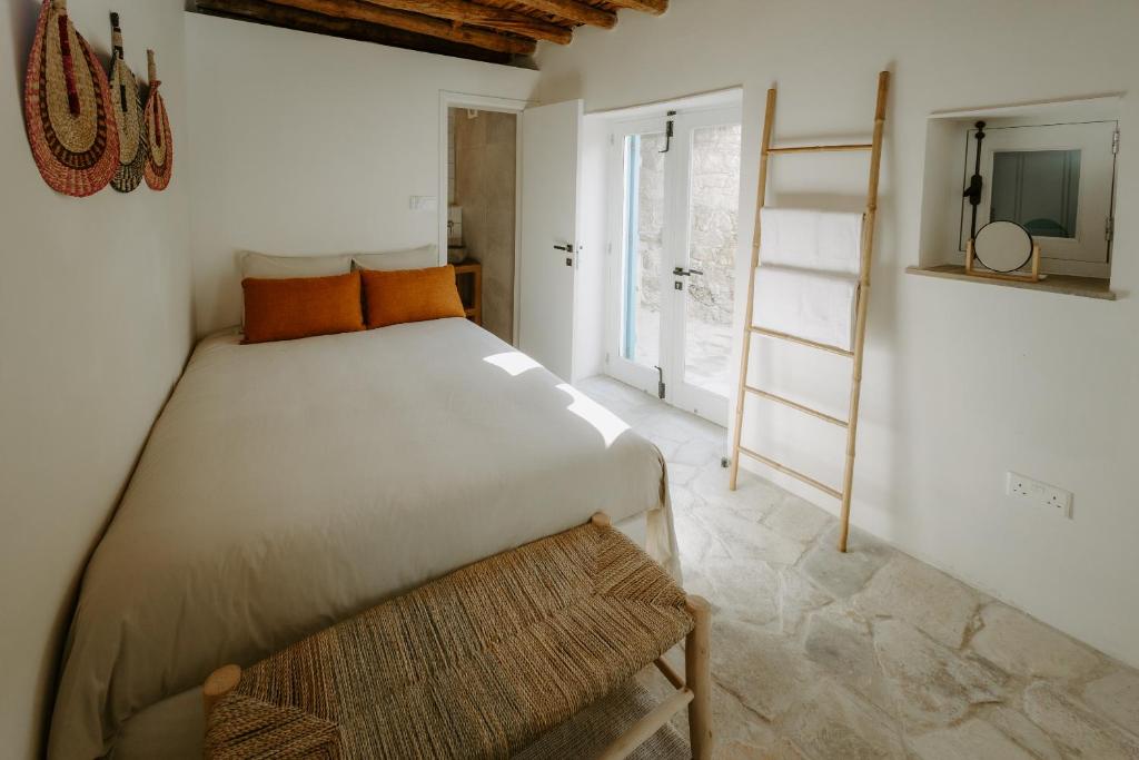 Postel nebo postele na pokoji v ubytování Smaragda's Guest Rooms