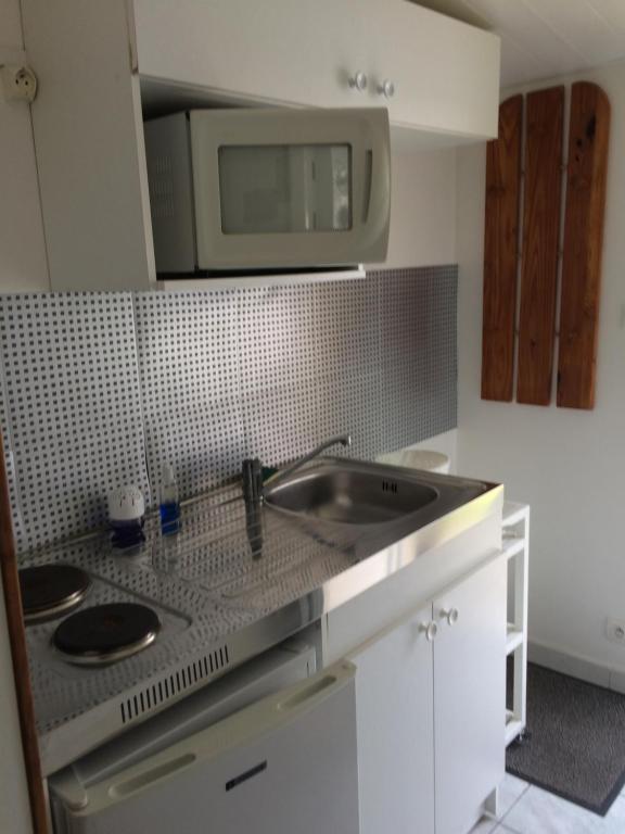 Kuchyň nebo kuchyňský kout v ubytování Chambres d'hotes Welcome Trépied
