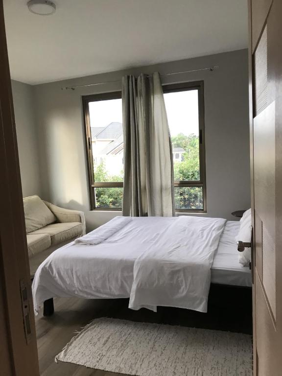 Postel nebo postele na pokoji v ubytování Runda Serene Accomodation