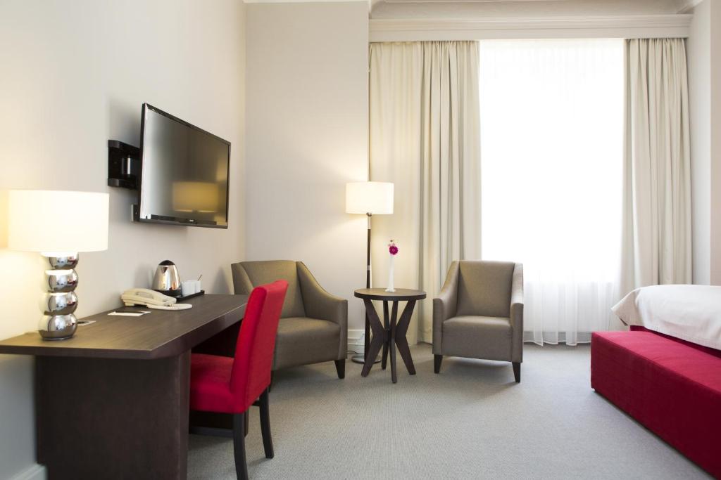 TV a/nebo společenská místnost v ubytování Elite Stora Hotellet Linköping