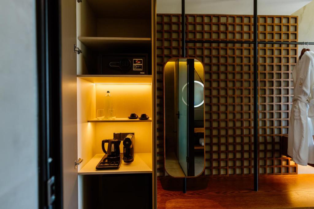 Kuchyň nebo kuchyňský kout v ubytování Cavo Zoe Seaside Hotel