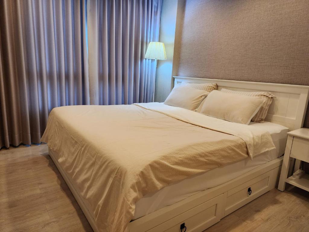 Postel nebo postele na pokoji v ubytování Family Suit 2 Bedrooms 2 Bathrooms in Chiang Mai