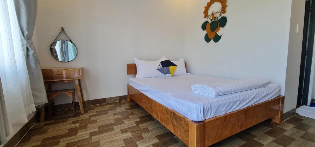 Postel nebo postele na pokoji v ubytování Sunrise Dốc Lết