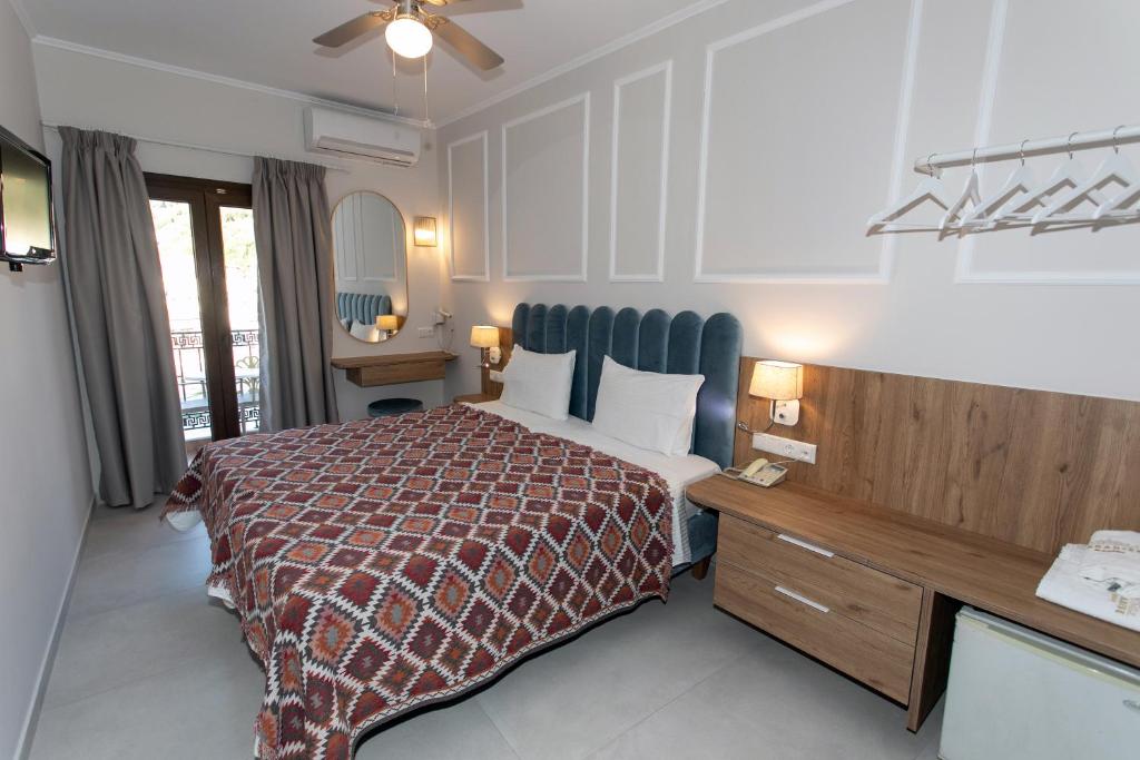 Postel nebo postele na pokoji v ubytování Paradise Hotel