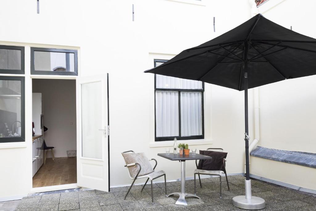Patio nebo venkovní prostory v ubytování Haarlem Hotel Suites