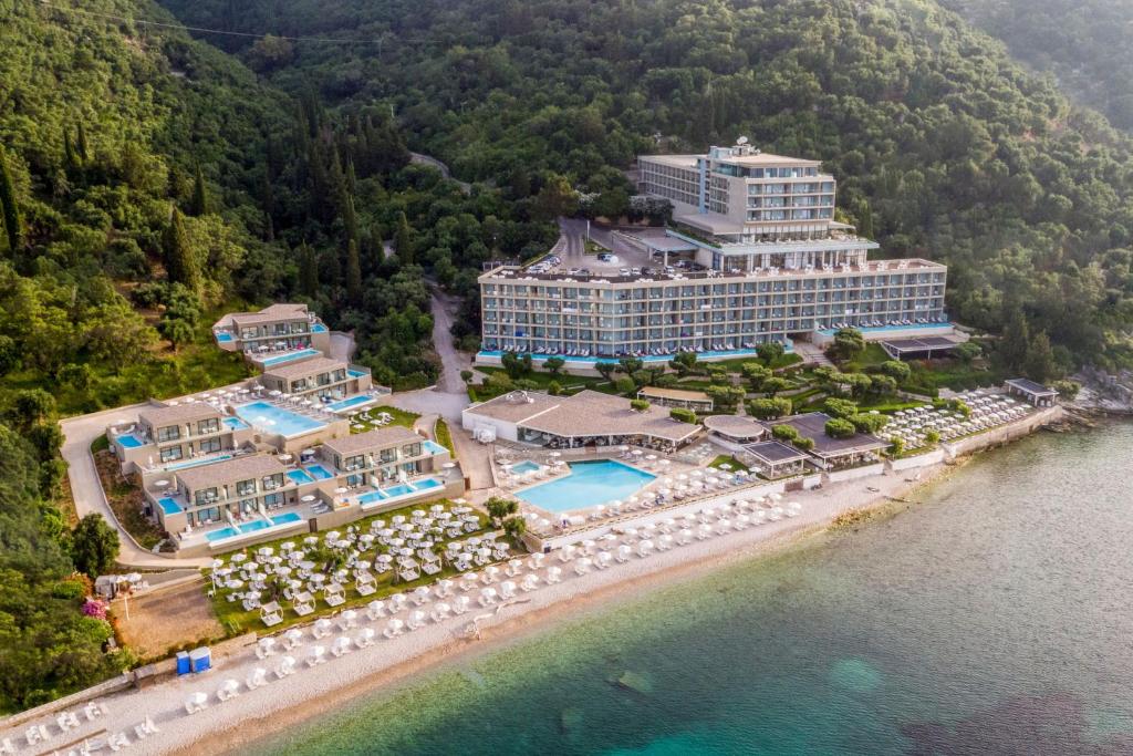 an aerial view of a resort on a beach at Atlantica Nissaki Beach - Adults Only in Gimari
