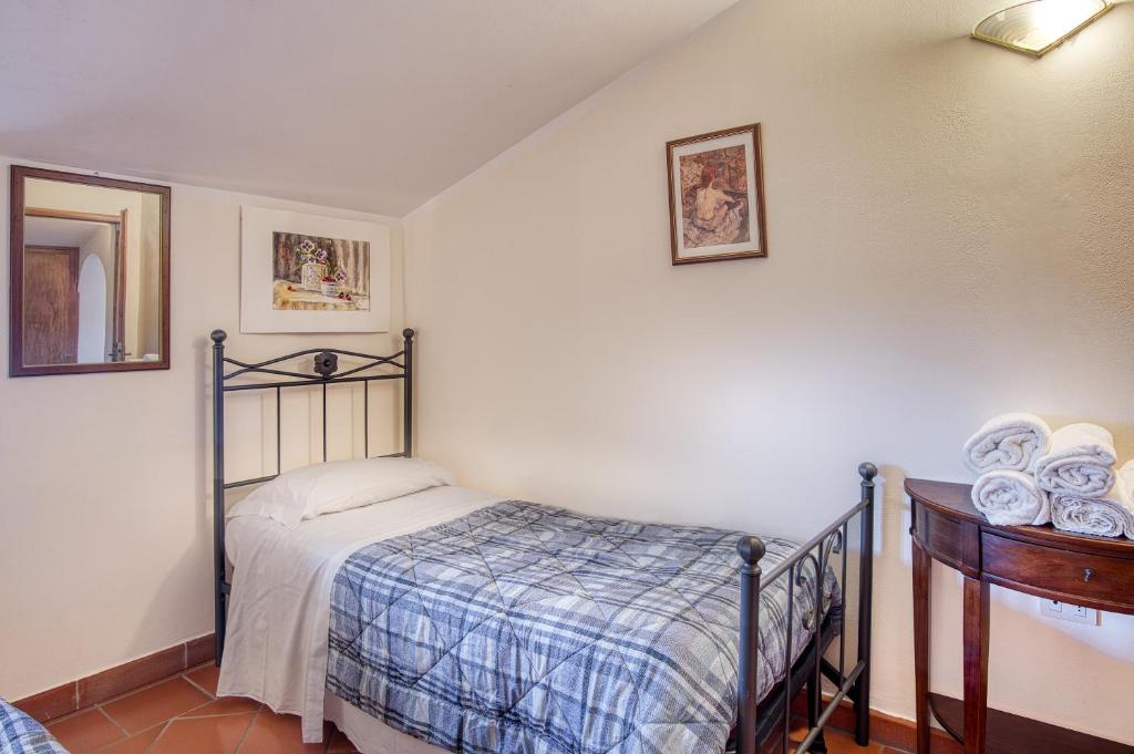 A bed or beds in a room at Magnolia ad Antico Casale '700