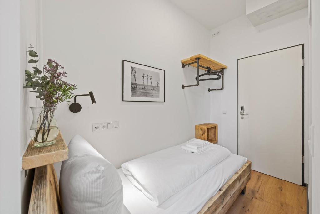 Postel nebo postele na pokoji v ubytování Hotel Comenius