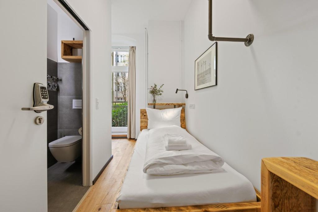Postel nebo postele na pokoji v ubytování Hotel Comenius