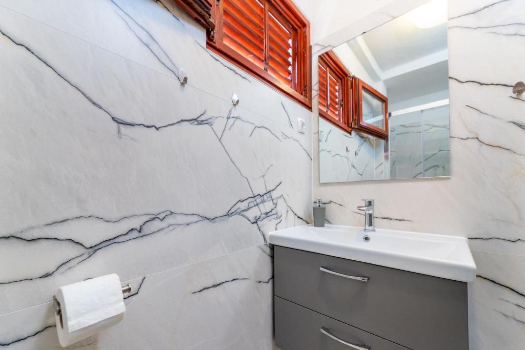 Kúpeľňa v ubytovaní Apartments Janko Zarok
