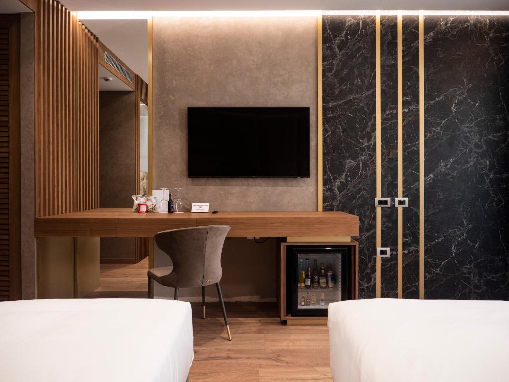 TV a/nebo společenská místnost v ubytování Marinaj Hotel & SPA
