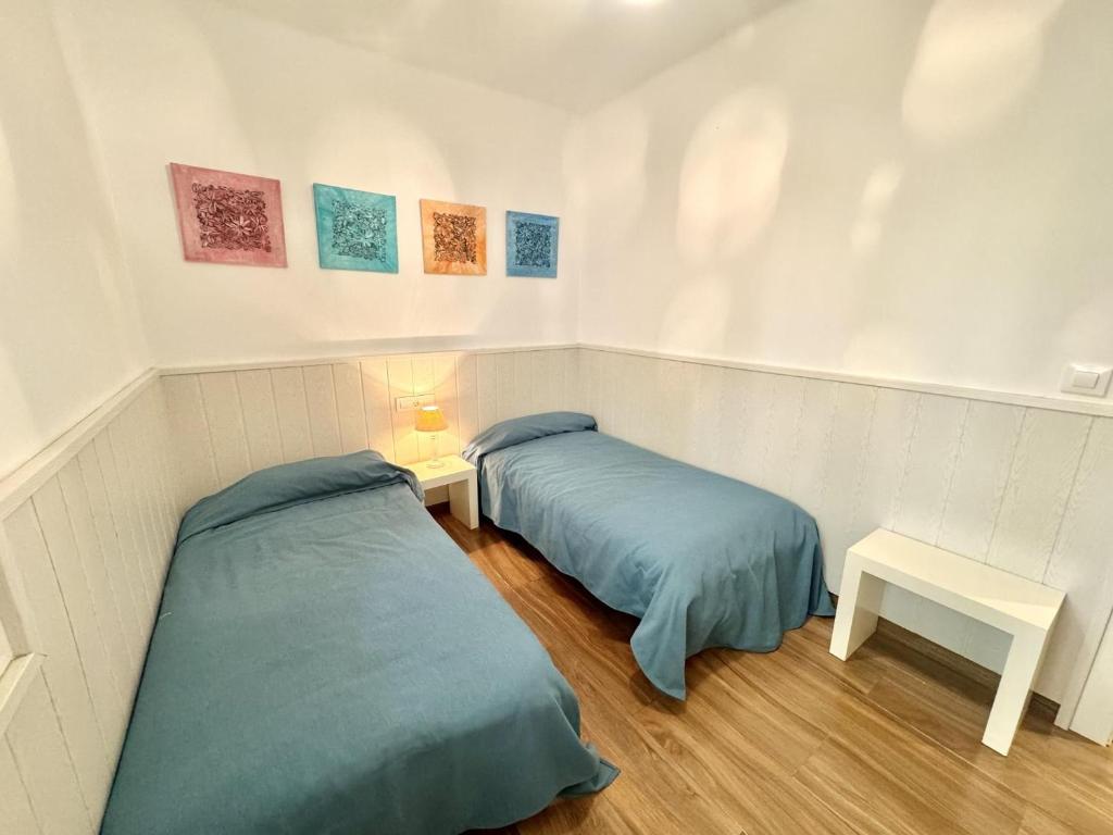 Postel nebo postele na pokoji v ubytování Las Delicias