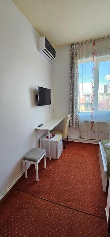 TV a/nebo společenská místnost v ubytování Hotel Olimp