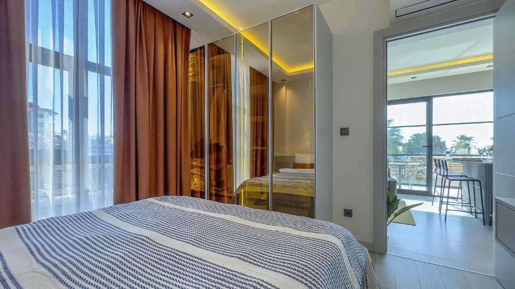 Postel nebo postele na pokoji v ubytování Ulu Panorama Residence