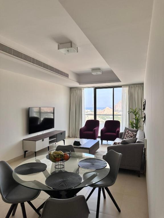 TV a/nebo společenská místnost v ubytování Elegant 3-Bed room Sea-View