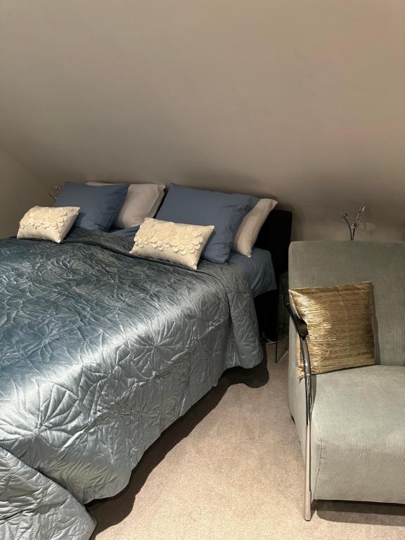 Postel nebo postele na pokoji v ubytování B&B Elegance Hamont
