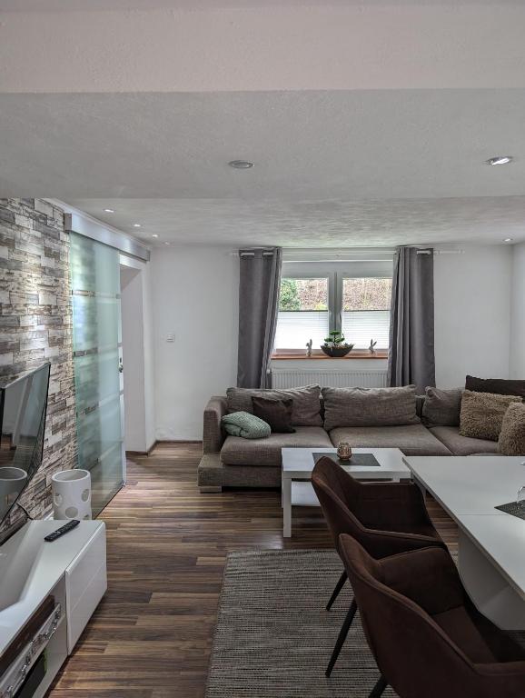 Posezení v ubytování Ferienwohnung Zum Kühlen Grund