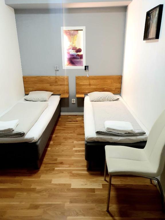 Postel nebo postele na pokoji v ubytování Mosebacke Hostel