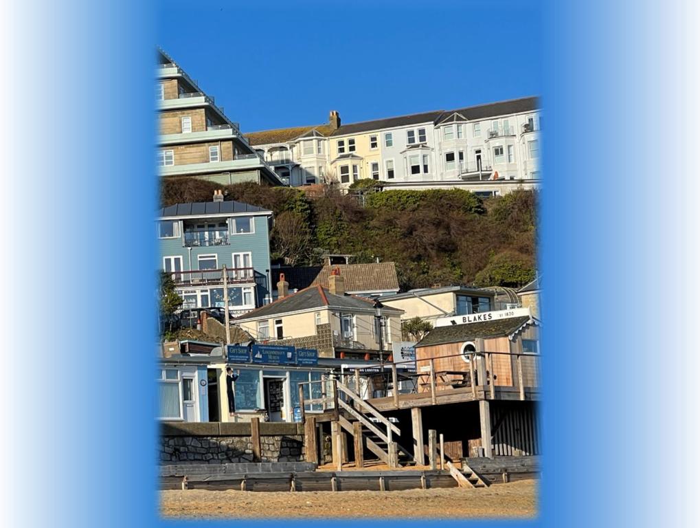a view of a city with houses and buildings at Sandy Toes - awesome beach view and access in Ventnor