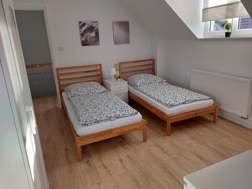 Postel nebo postele na pokoji v ubytování Holiday Home Mierki