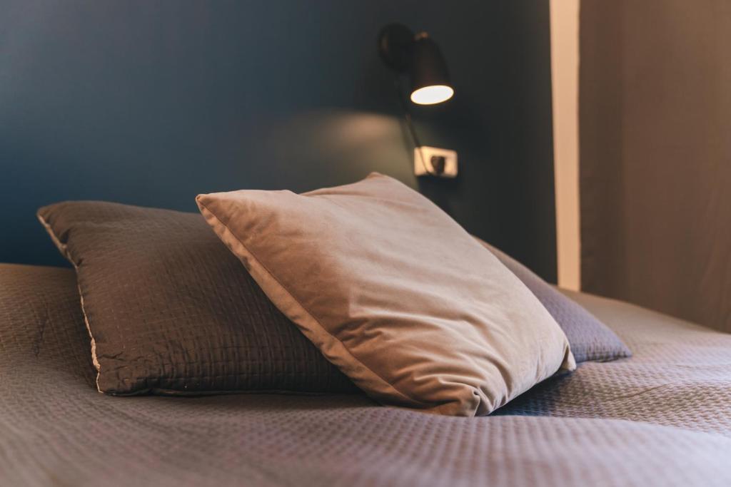 Postel nebo postele na pokoji v ubytování Danhostel Aarhus City