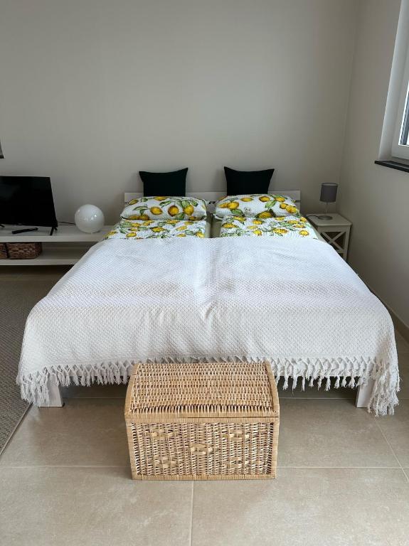 Postel nebo postele na pokoji v ubytování Ferienwohnung IDA