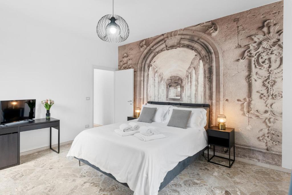 Ένα ή περισσότερα κρεβάτια σε δωμάτιο στο Pangea Luxury Apartments