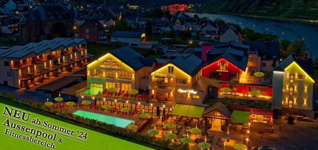 a model of a building with lights on at Mosel Village Resort in Ellenz-Poltersdorf
