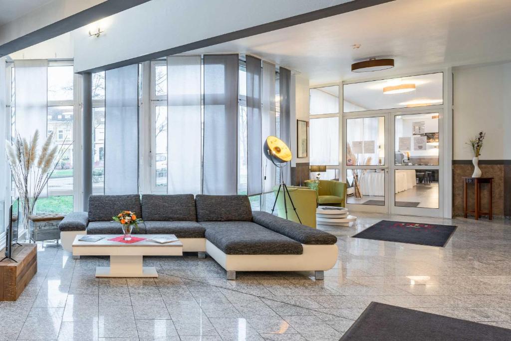 Khu vực ghế ngồi tại Astoria City Resort Essen