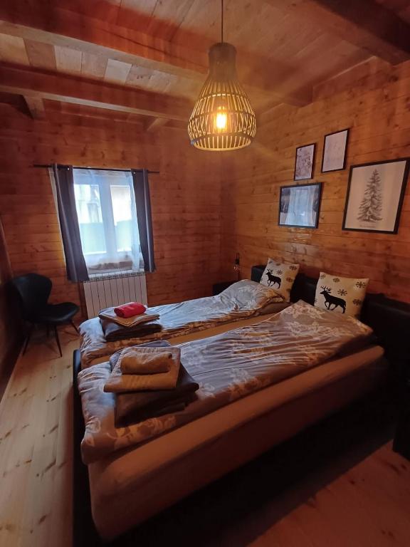Postel nebo postele na pokoji v ubytování Drinska Dama