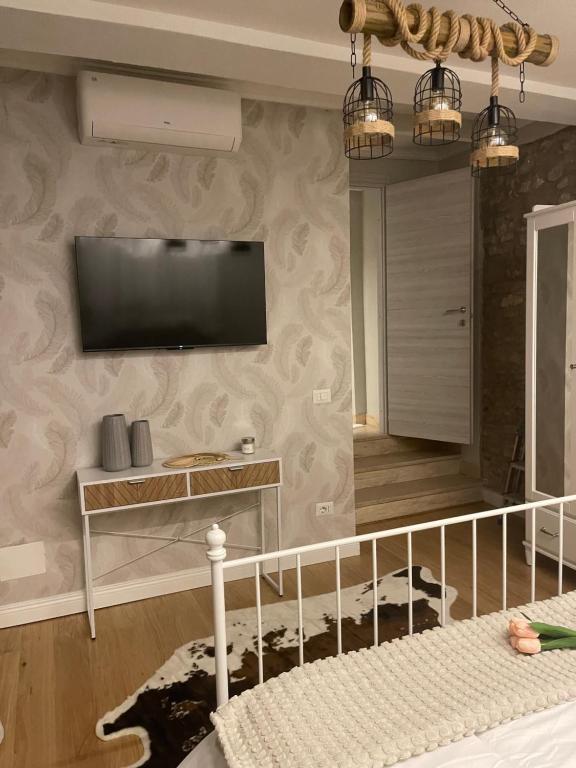 TV a/nebo společenská místnost v ubytování Il Borghetto