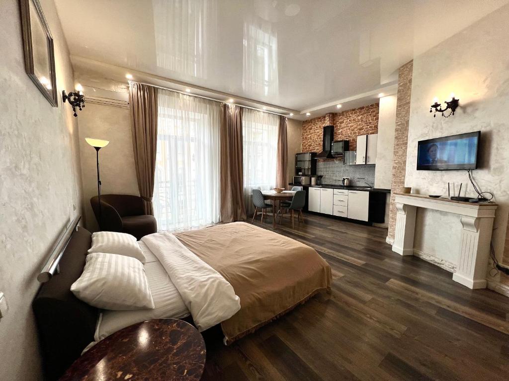 Llit o llits en una habitació de Kyiv Panna Apartment