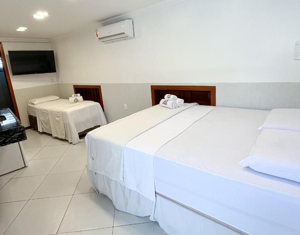 Postel nebo postele na pokoji v ubytování Mini Hotel Dunas