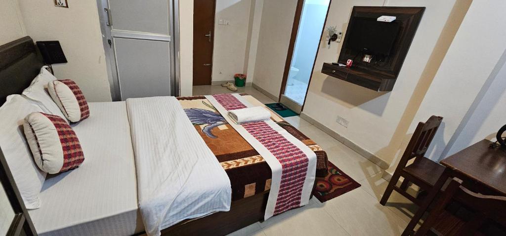 Rúm í herbergi á Hotel Simara