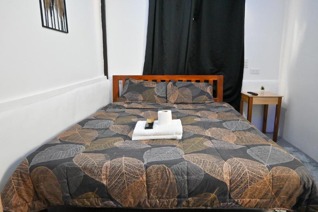 Voodi või voodid majutusasutuse Trisha Guesthouse toas