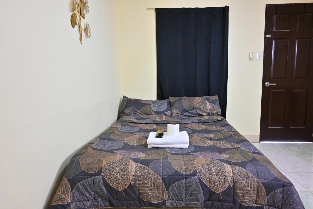 Voodi või voodid majutusasutuse Trisha Guesthouse toas