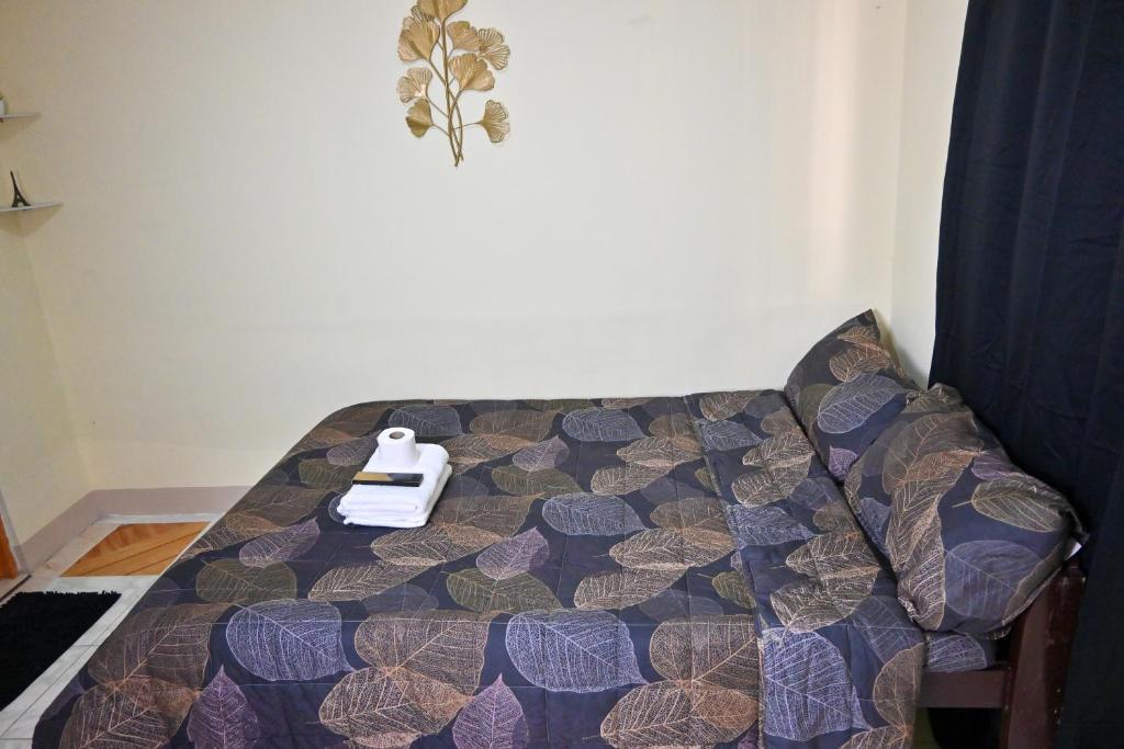 Voodi või voodid majutusasutuse Trisha Guesthouse toas