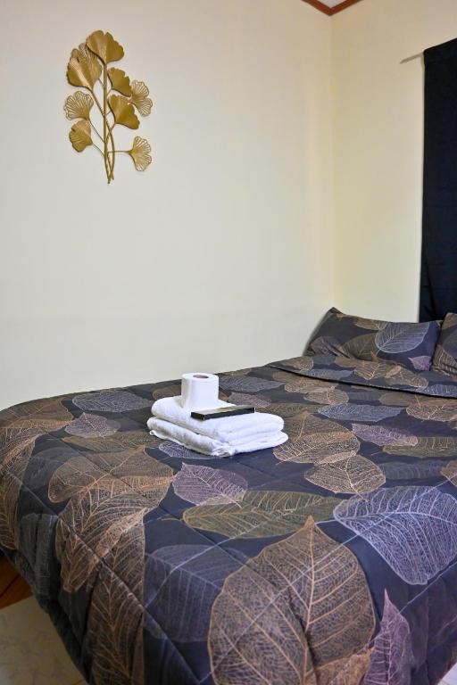 Voodi või voodid majutusasutuse Trisha Guesthouse toas