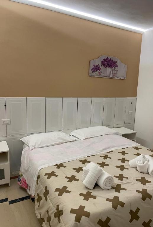 Postel nebo postele na pokoji v ubytování SOLARIS PAESTUM