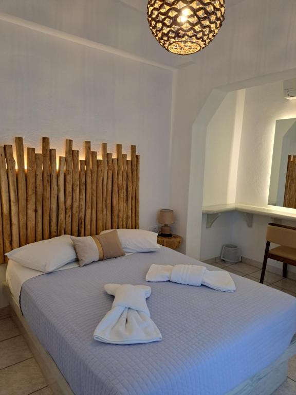 Łóżko lub łóżka w pokoju w obiekcie Pension Stella