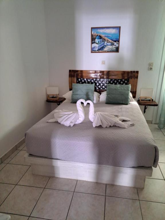 Łóżko lub łóżka w pokoju w obiekcie Pension Stella