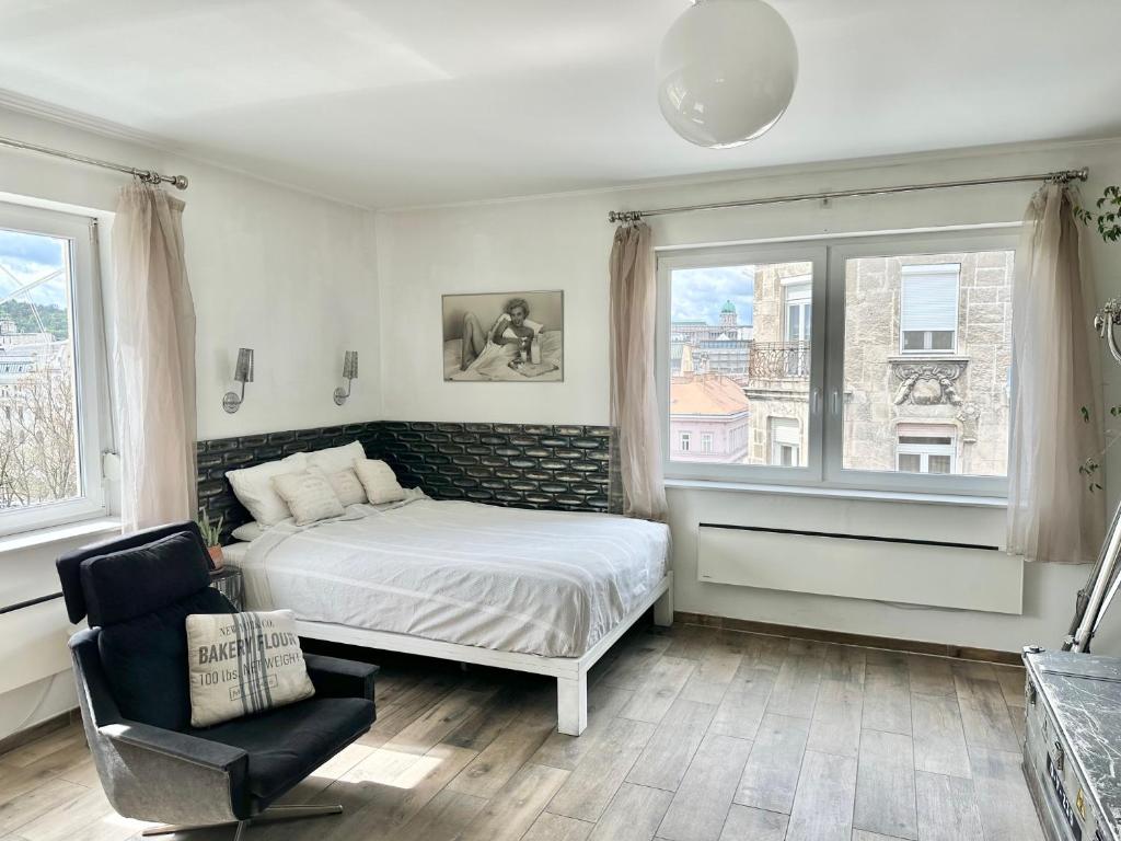 Posteľ alebo postele v izbe v ubytovaní Vista Suites 1-2