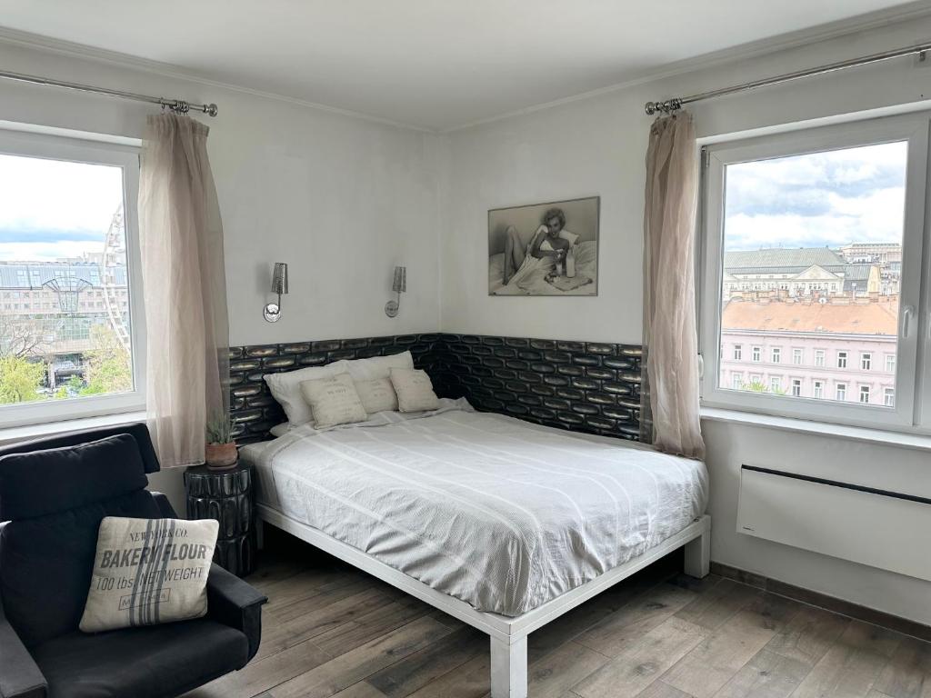 Posteľ alebo postele v izbe v ubytovaní Vista Suites 1-2