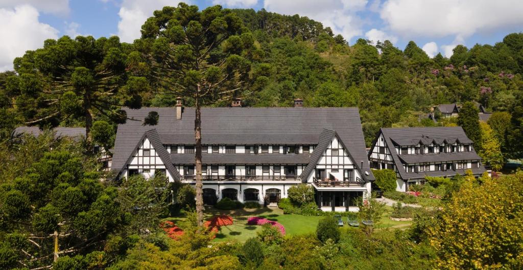 an aerial view of a large house at Ort Hotel in Campos do Jordão